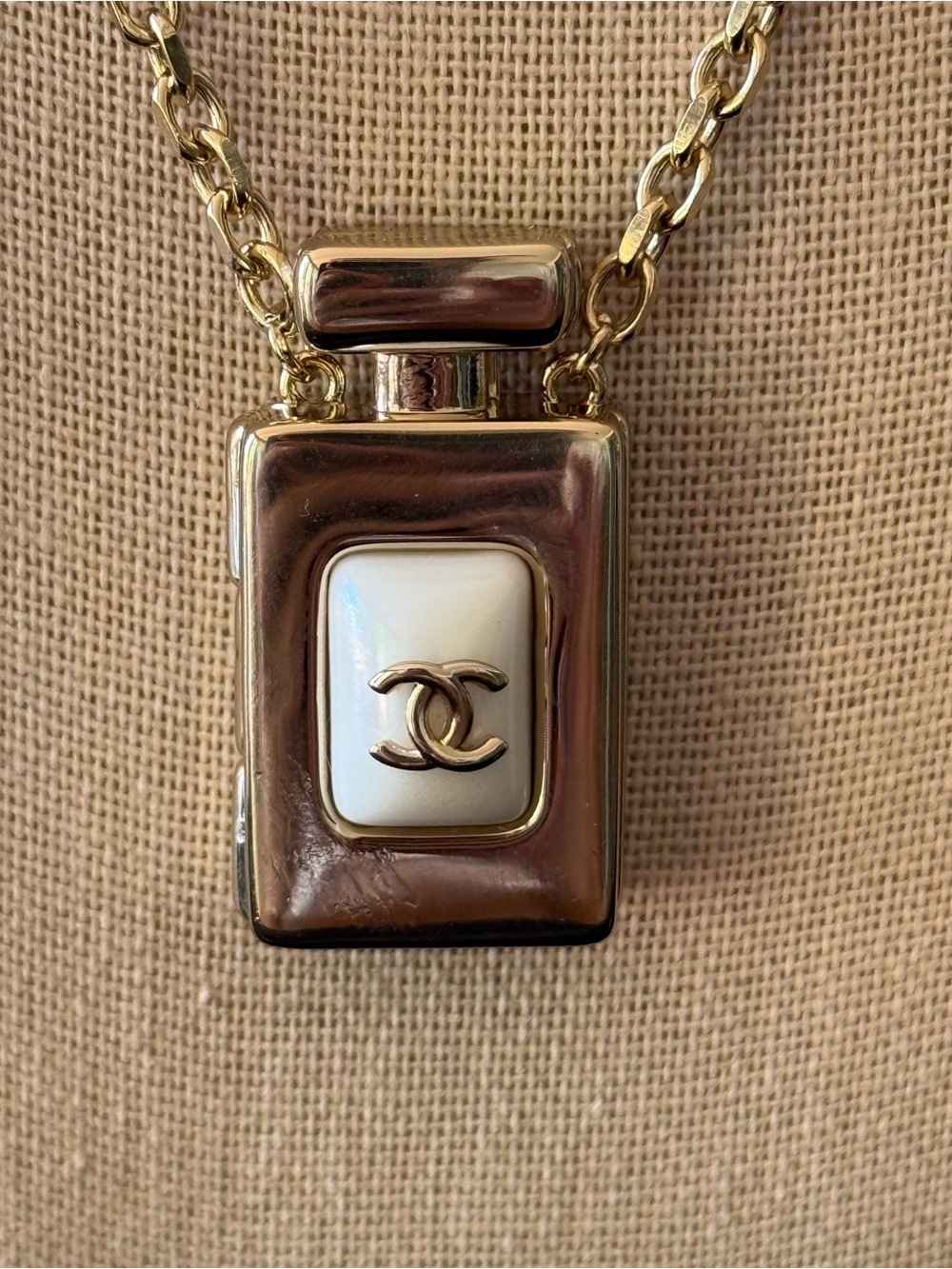 Chanel Locket. Gold-Tone Perfume Bottle Pendant 24”Necklace with White Inlay